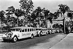 Line of Buses Traveling Through Entrance, 1924