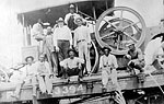 Road Equipment and Workers on Florida East Coast Railroad Flat Car, 192-
