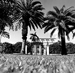 Distant View of the Flagler Museum Behind a Gate, Palm Beach Florida, 1975